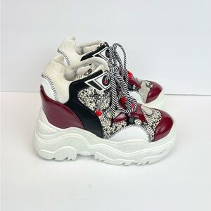 Anthony Wang
COLLECTION Red and White Platform Sneakers Women’s Size 8